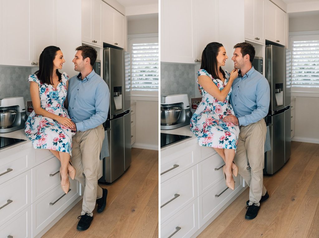 bun in the oven pregnancy announcement with married couple in kitchen