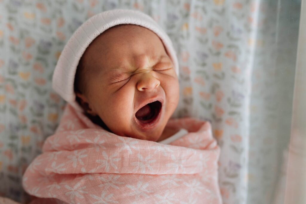 Newborn baby yawning